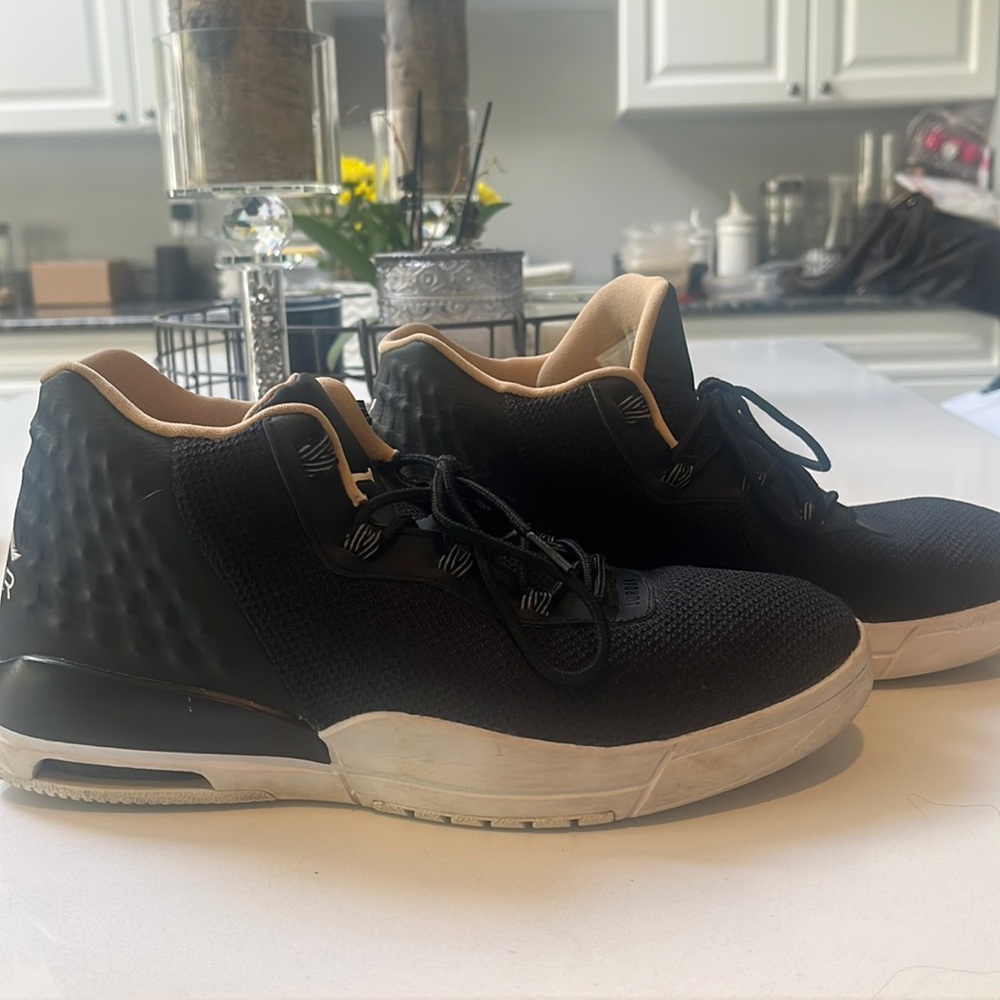 Gently worn black and white air Jordan sneakers in excellent condition